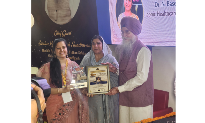 Dr N Basetti receiving honor from Punjab Speaker in Chandigarh